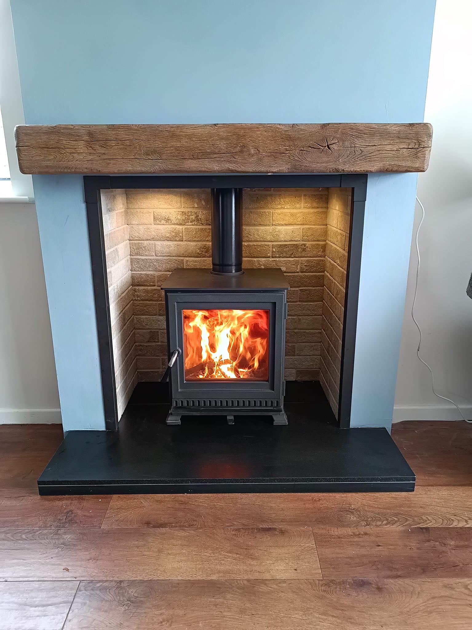 Cozy living room with log burner